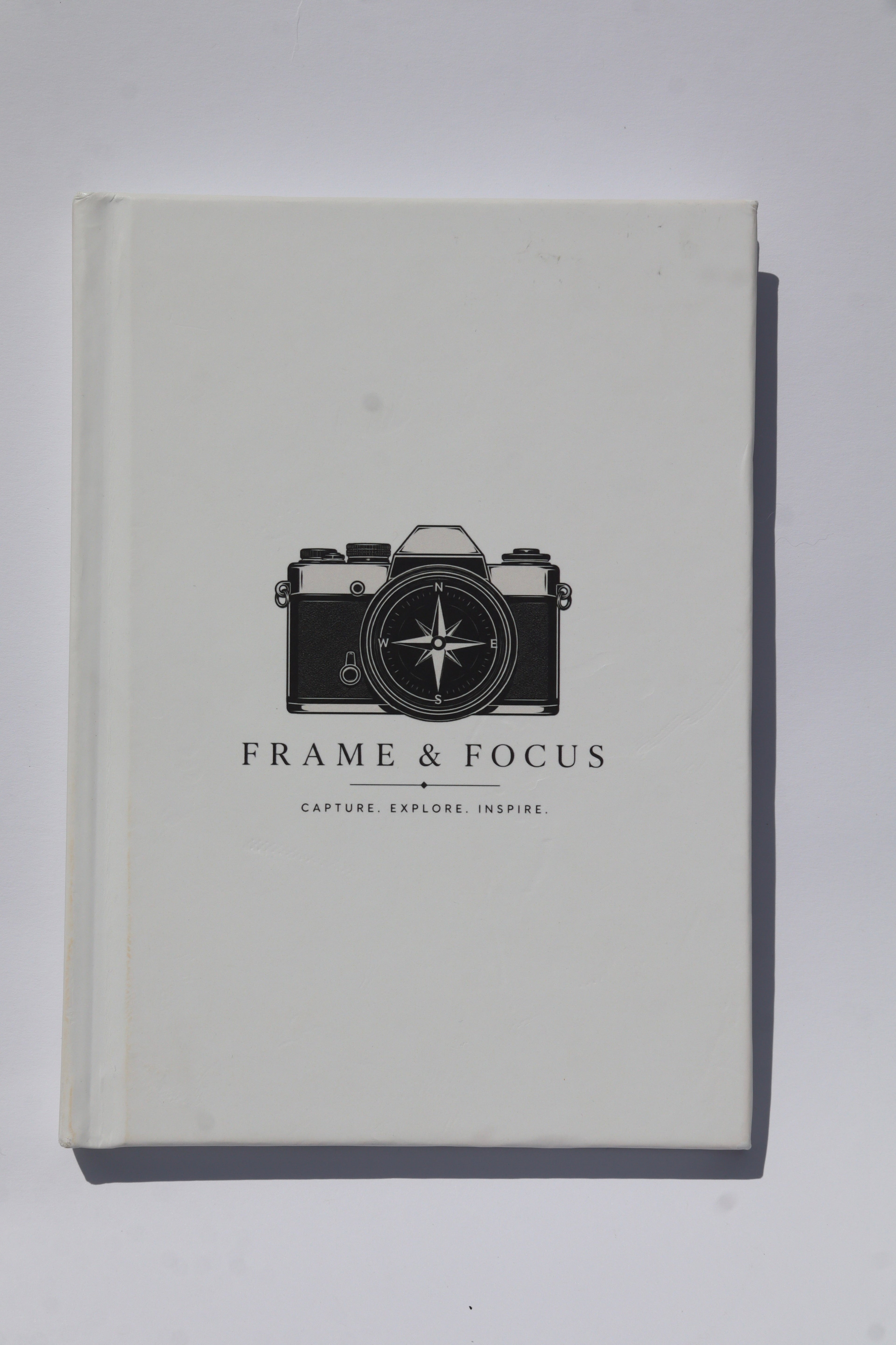 The Compass Journal — Frame & Focus