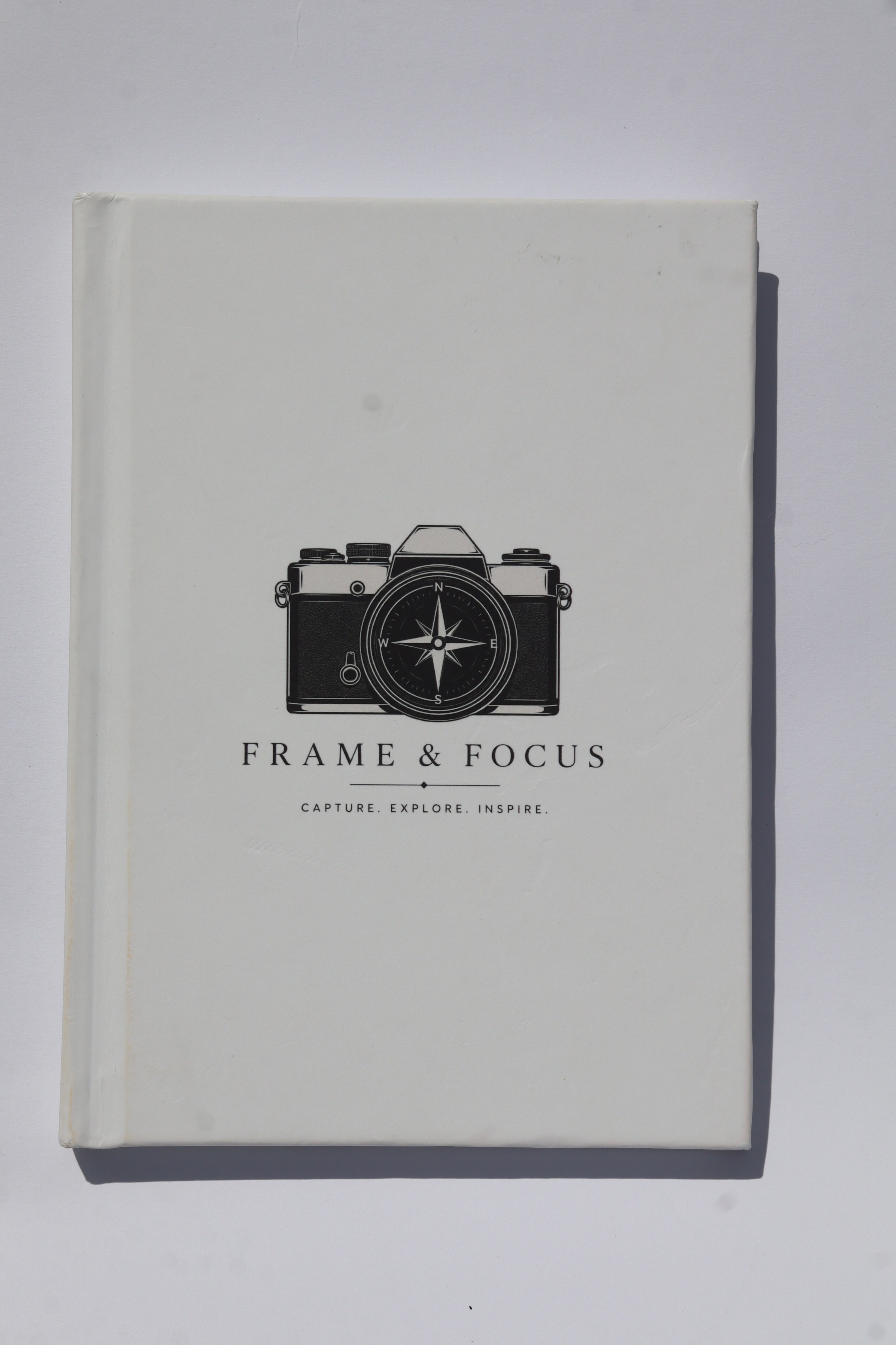 The Compass Journal — Frame & Focus